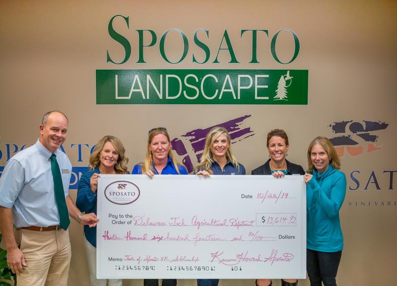 Check presentation attendees shown are (l-r) Tony Sposato, co-owner of Sposato Family Vineyards; Janelle Boyer, director of communication and planning at Delaware Tech in Georgetown; Christel Folke, agriculture instructor at Delaware Tech in Georgetown; Karen Sposato, co-owner of Sposato Family Vineyards; Dr. Bobbi Barends, vice president and campus director at Delaware Tech in Georgetown; and Monique Bamforth, co-owner of Seashore Striders. SUBMITTED PHOTO